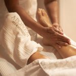 Close-up of a foot massage at Aponema Spa, emphasizing relaxation and wellness.